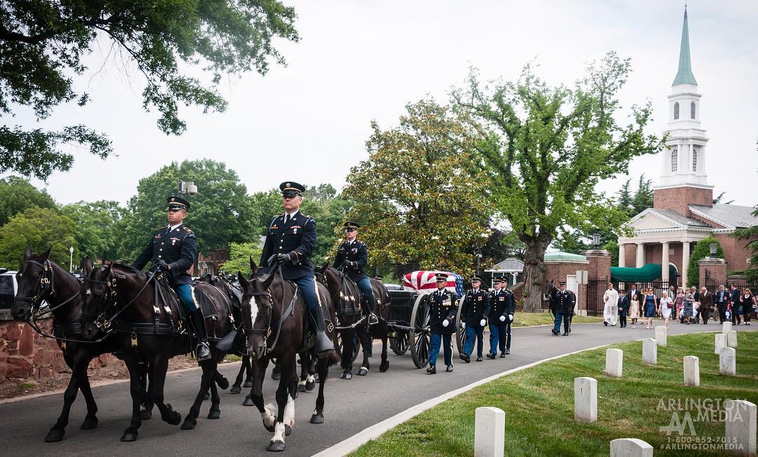 A caisson team moving in position outside the Old Post Chapel
