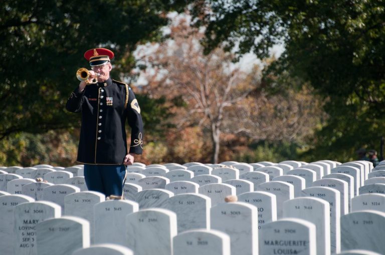 A Bugler From The U S Army Band “pershings Own” Plays Taps During